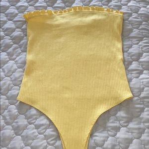 Women’s yellow strapless bodysuit